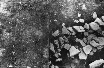 Excavation photograph ; trench K - photogram - E50 - 52, N64 - 66.
