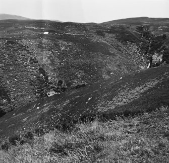 Excavation photograph : Kilphedir glen with tent marking location of hut circles and arable land.