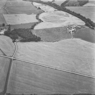 Oblique aerial view showing Roman camp at Dalginross, Perthshire