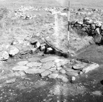 Excavation photograph : central hearth in the Long-house.