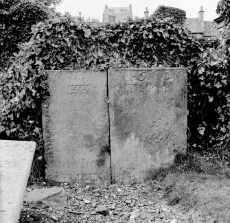 Detail of tombstone inscribed 1692, St Mary's Church burial ground, Banff.