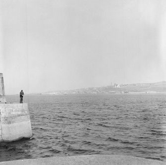 View of North pier, Banff Harbour, looking towards Macduff.