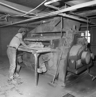 Kirkcaldy. Nairn's Linoleum works. View showing the loading of oxidised 'cement' slabs into the mixing machines