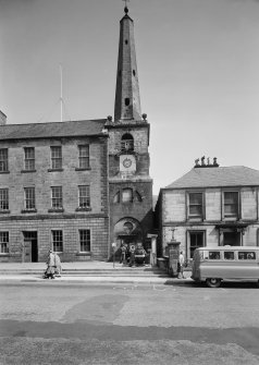 General view of town house, tolbooth steeple and 32 Low Street, Banff, from west.