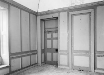 Interior view of South Lodge, Broxmouth Park, showing panelled room.