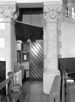 Interior view of Trinity Free Church, Irvine, showing detail of stone column and capital.