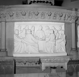 Interior view of Trinity Free Church, Irvine, showing detail of stone frieze.