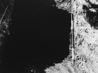 Excavation photograph: outer rampart in process of excavation.