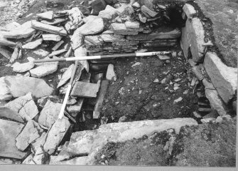 Tres Ness, Sanday. 
Central chamber of eroded chambered cairn.