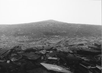 Tres Ness, Sanday. 
Eroded chambered cairn from a distance.