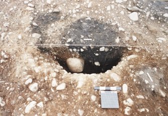 Excavation photograph : F093 - half sectioned.