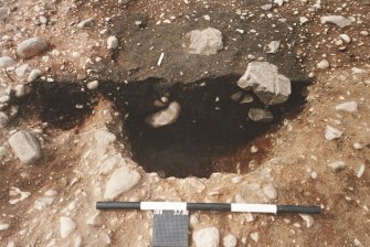 Excavation photograph : F089 half sectioned.