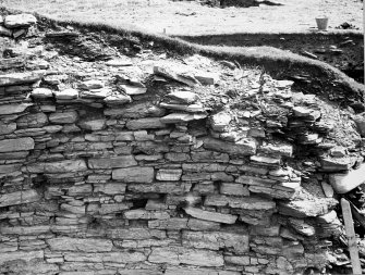 Excavation photograph : Broch wall in front of guard cell (east side).
