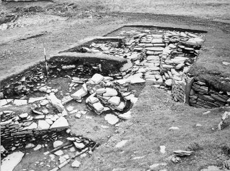 Excavation photograph : Extended entrance passage, entry to enclosure I.