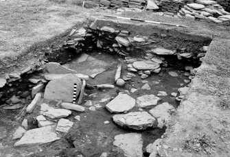 Excavation photograph : interior of enclosure 1, with stone box which formed part of grave II.