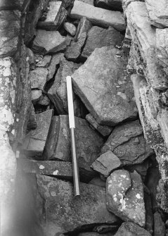 One of four prints of top of N intra-mural broch cavity, showing collapse of upper cavity into ground floor one, and lack of paving capping stone. (From W) Broch of Gurness, Aikerness.