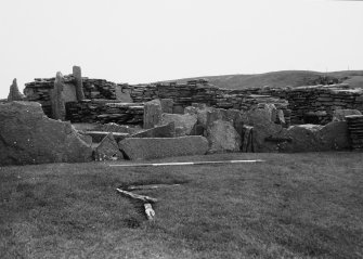 Slab built wall between Buildings 1 and 2, from west. Broch of Gurness, Aikerness.