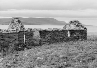 Survey photograph : site 51c - shot, from front of agricultural building of drystone construction.