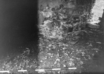 Excavation photograph - Practice flash. Area D-N, end cellar before excavation