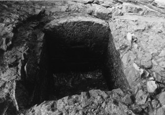 Excavation photograph - W Aumbry in cellar 107