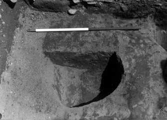 Excavation photograph - Area 5: close up of pit F033 partially excavated