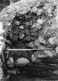 Excavation photograph : N tower - robbed and partially rebuilt walling.