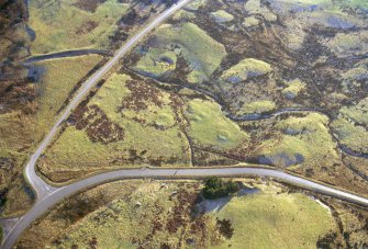 Near overhead aerial view of sites at The Cashel, near The Ord, Lairg, Sutherland, looking S.