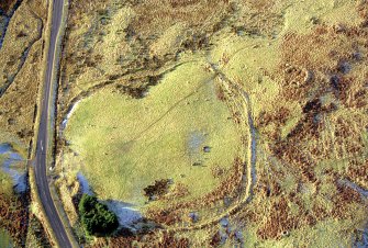 Overhead aerial view of enclosure at S end of The Ord, near Lairg, Sutherland, looking W.  