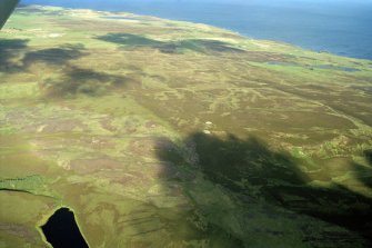 An oblique aerial view of the five Warehouse Cairns, Wick, Caithness, looking E.