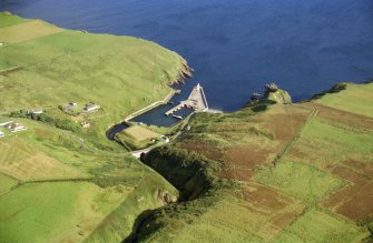 An oblique aerial view of Lybster harbour, Caithness, looking SE.