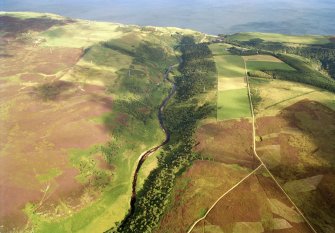 An oblique aerial view of Karrug, Berriedale, Latheron, Caithness, looking SE.