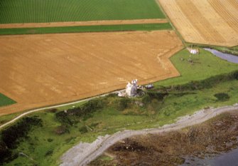 Aerial view of Ballone Castle E of Portmahomack, Tarbat Ness, Easter Ross, looking N.