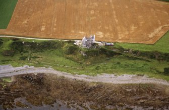 Aerial view of Ballone Castle E of Portmahomack, Tarbat Ness, Easter Ross, looking NW.