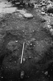 Excavation photograph : south-west corner of casting house prior to excavation, from west.