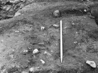 Excavation photograph : south-west corner of casting house prior to excavation, from east.