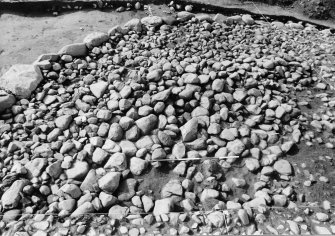 Excavation photograph : cairn from above - south-west quadrant, structural level.