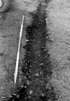 Excavation photograph.  Feature 1.  Palisade trench, looking from entrance.