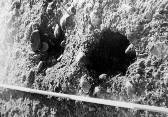 Excavation photograph.  Features 11 & 12