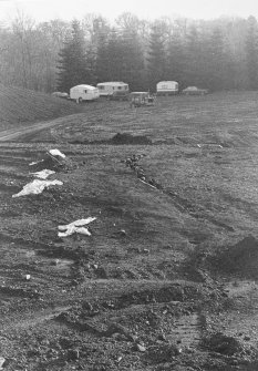 Excavation photograph.  Feature 1.  View of palisade trench and entrance from NE.