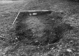 Excavation photograph : area C - end of curving ditch, partially excavated, from north.