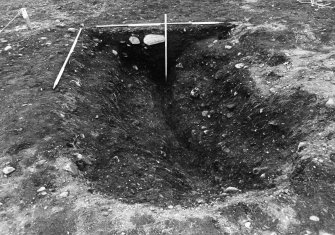 Excavation photograph : area C - f0009, terminal ditch section with probable secondary cut, from north.