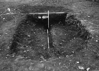 Excavation photograph : area C - f0009, terminal ditch section showing primary cut, from north.