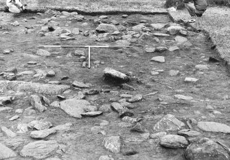 Excavation photograph : area 1 - f4001, looking south, towards Hut K. (inaccurate description in photographic register)