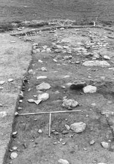 Excavation photograph : area 4 - Hut K, from S, in foreground.