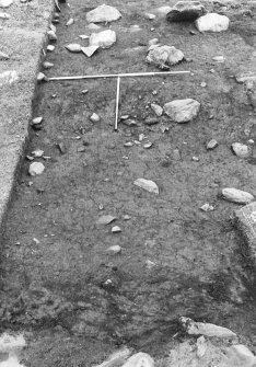 Excavation photograph : area 4 - Hut K, from S, in foreground.
