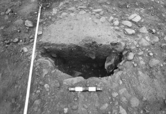 Excavation photograph : area 7 - F7081 - half section from east.