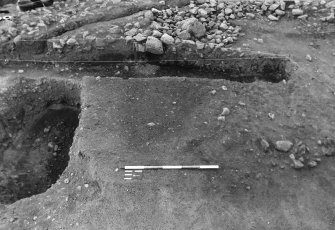 Excavation photograph : F8075 - pre ex - neg feature showing through.
