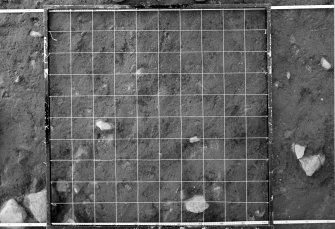 Excavation photograph : area 5 - F012/013 photogram - survey of stone packed feature 47/27.