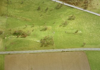 Aerial view of Chapelton hut circles, W of Boat of Garten, Speyside, looking SSE.