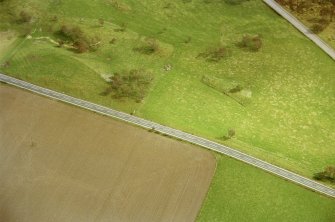 Aerial view of Chapelton hut circles, W of Boat of Garten, Speyside, looking SE.